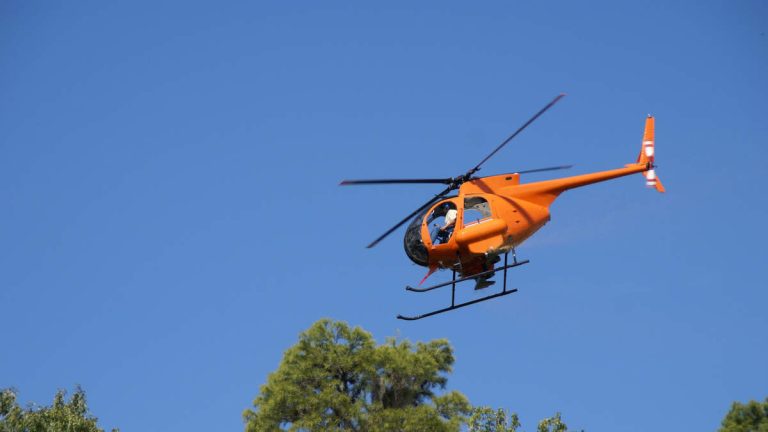 Mosquito-Spraying Helicopter Hit By Golf Ball