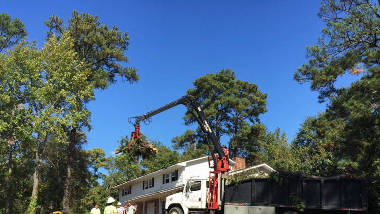 Semi Truck Tips Over And Lands On Roof Of House