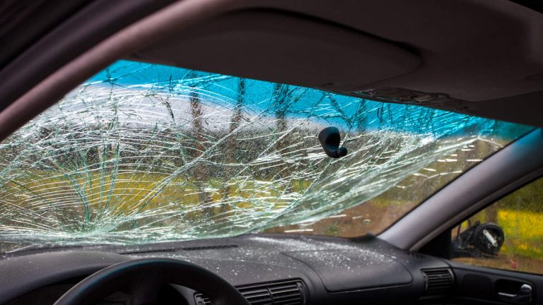 WATCH: Large Piece Of Metal Impales Car Windshield As It Cruises On Highway