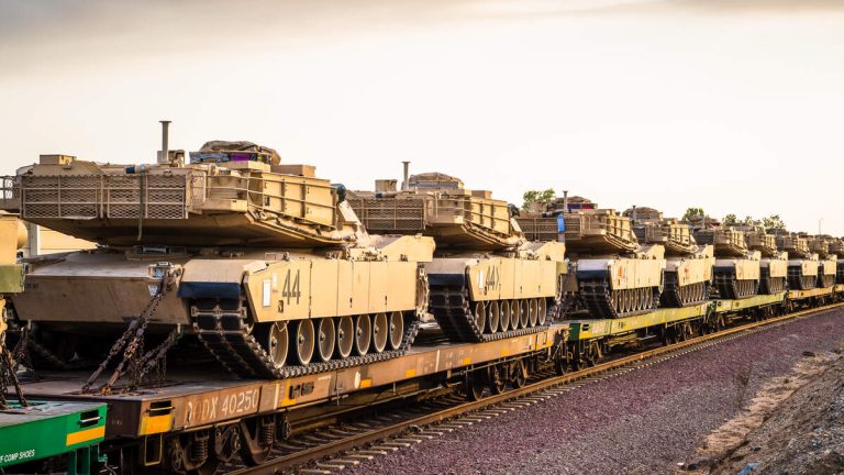 WATCH: Freight Train Slams Into Truck Carrying Tank That Was Stuck On Track