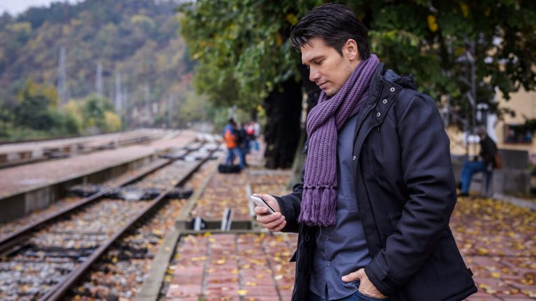 WATCH: Man Nearly Gets Hit By Tram While Staring At His Phone