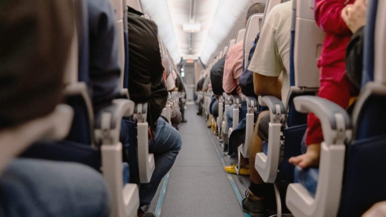 WATCH: Crazed Airline Passenger Tries To Destroy His Seat