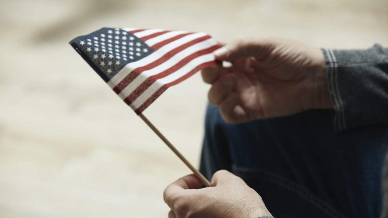 WATCH: Police Escort Man From Council Meeting For Waving American Flag