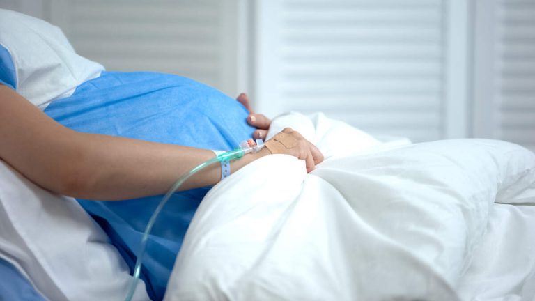 Woman Settles Suit Over Leave Taken For Multiple Miscarriages
