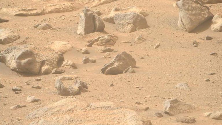 Mars Rover Discovers Eerie Human Face Seemingly Carved Into A Rock