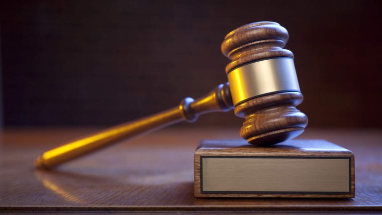 Ex-Wife of Slain Doctor Appears in Court to Face Murder Charge