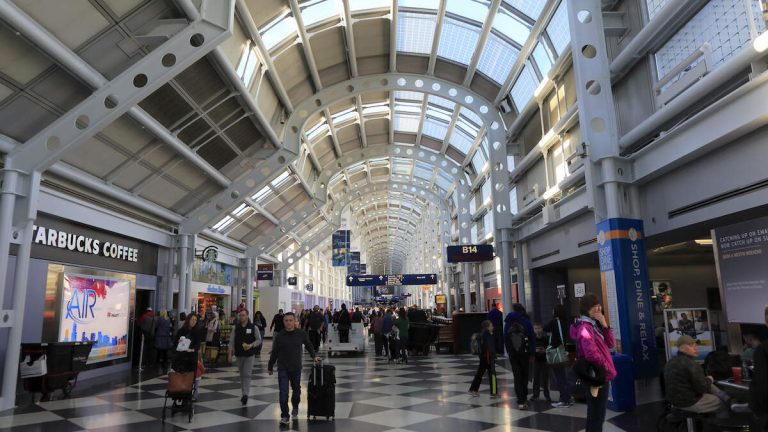 Video Shows Travelers Swinging ‘Wet Floor’ Signs During Airport Brawl