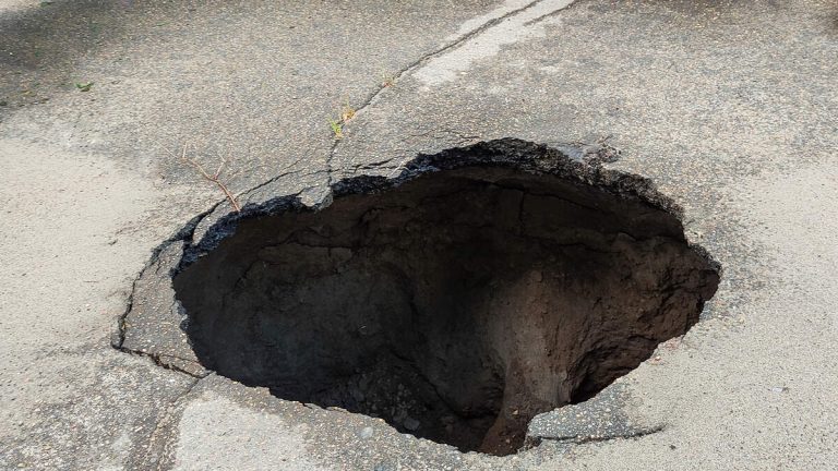 Woman Likely Died Falling Down 30-Foot Sinkhole While Looking For Her Cat