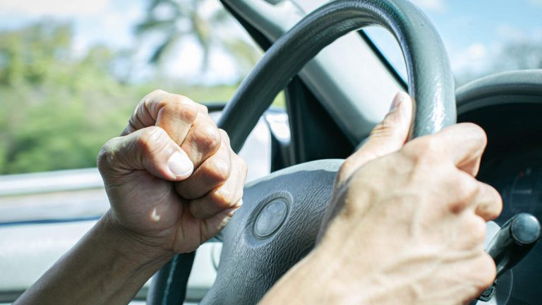 WATCH: Angry Driver Tries To Push Car Off Bridge With His SUV