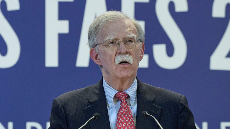 Ex-Trump Adviser John Bolton Surrenders