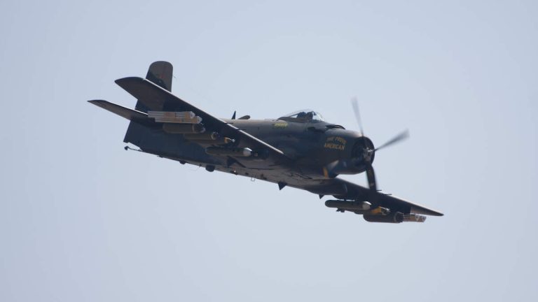 Frightening Video Shows Military Plane Nearly Hit Car During Crash Landing