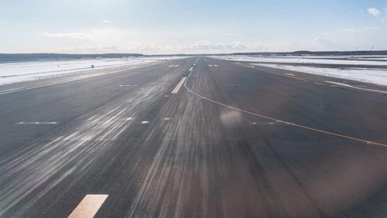 Plane Skids On Icy Runway Amid Post-Thanksgiving Snow Storm