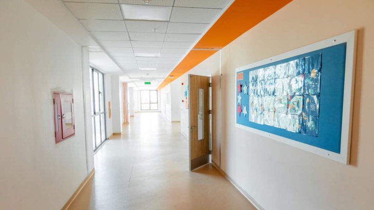 Surveillance Video Shows Assistant Dragging Autistic Student Down Hallway