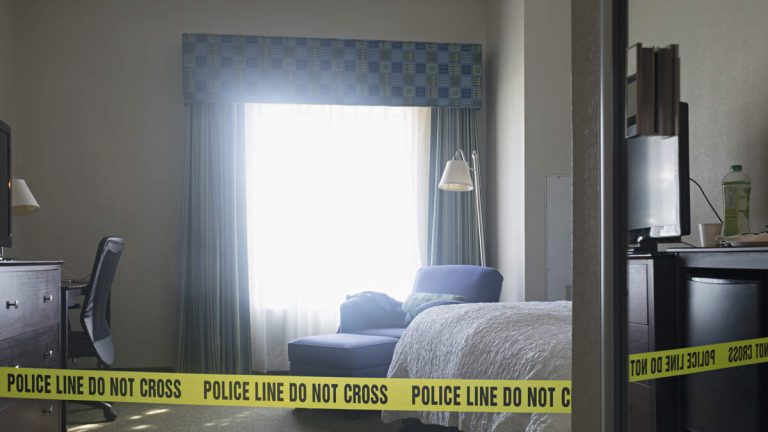 Officers Shot By Man Who Invited Them Into Hotel Room During Questioning