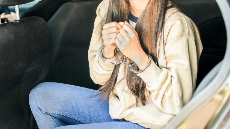 Handcuffed Woman Who Climbed Out Of Police Car Window Arrested Days Later