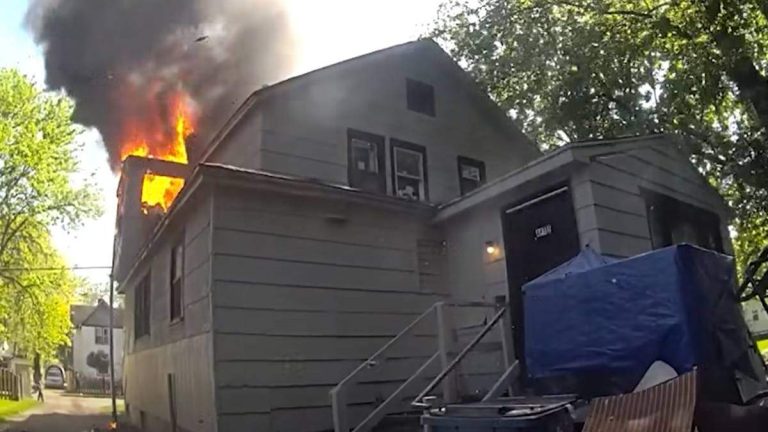Dramatic Video Shows Cop Catching Baby Dropped Out Window Of Burning Home
